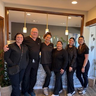 Dr. Adam Janette with the San Luis Oral Surgery clinical team at the Peach Street office